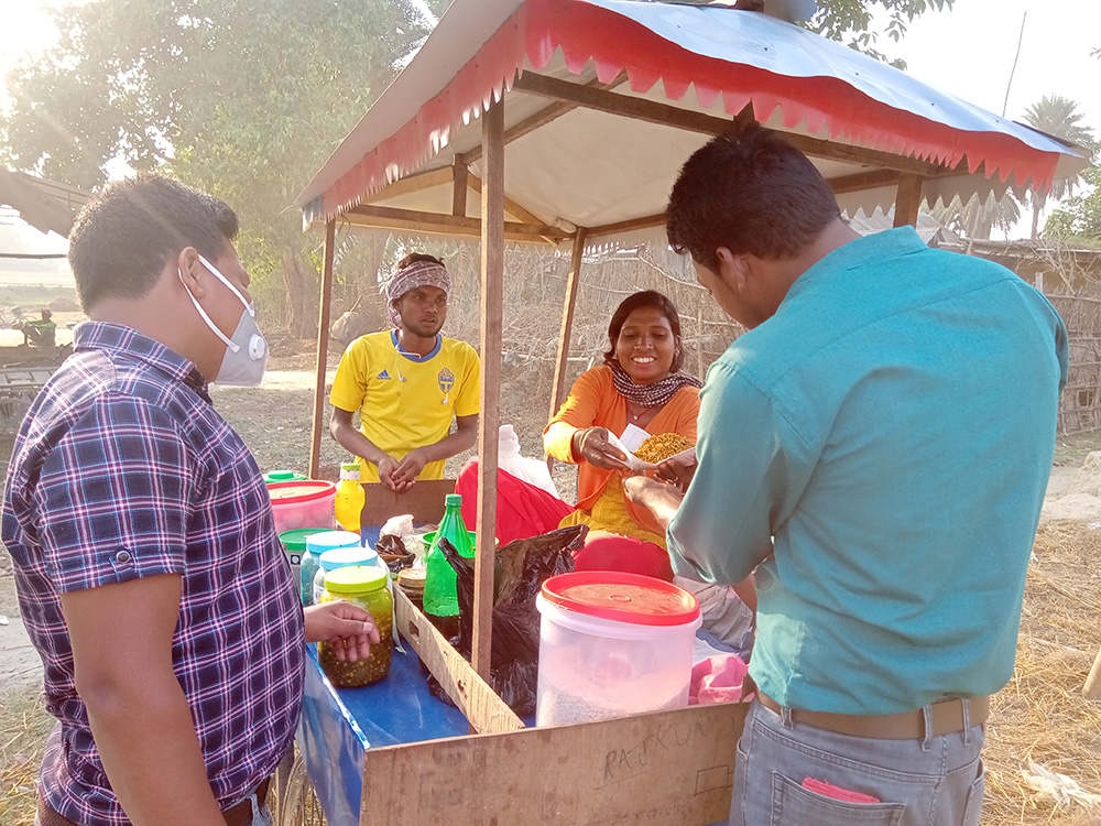 Parbati selling Chatpate to the customer